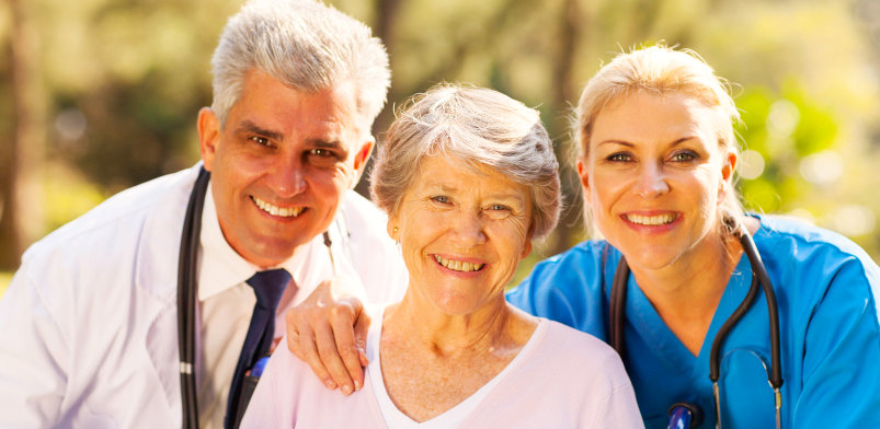 portrait of healthcare workers and senior patient 